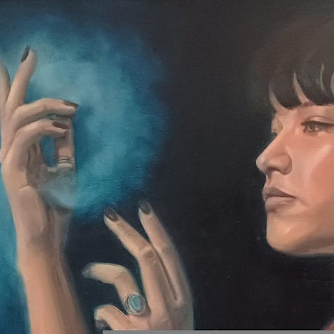 Hands held in front of her face, feeling the blue mist, the essence.