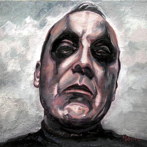 Male portrait painted, dark make-up around the eye with a sad expression